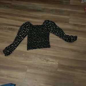 Very stretchy black with flowers shirt